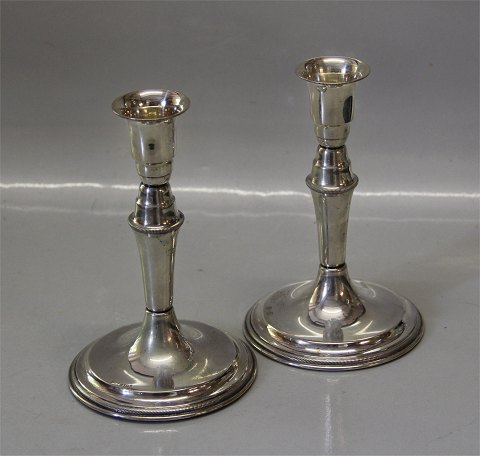 Pair of Silver candlestick Danish Silver smith Svend Toksvaerd 15 cm Marked 830 
S and  Sv.T. Foot filled with plaster
