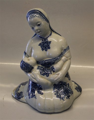 Royal Copenhagen figurine 1887 RC Mother with child overglaze blue & grey glaze 
26.5 x 20 cm Signed HC