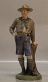 Royal Copenhagen figurine 
1648 RC Boy Scout at the tree stump Chr. Thomsen 1914 25 cm