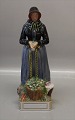 Royal Copenhagen figurine 
12102 RC Acht Pitter Bacher´s daugther Market Costume, Amager 12.25" 31 cm