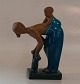 Royal Copenhagen Stoneware Sculpture Johannes Hedegaard 21565 RC Woman with 
child on the back 7.25" x 5.25 (ca 18 cm)