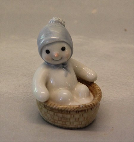 Royal Copenhagen figurine 0401 RC Winther series, Snowman, Baby Arthur in a 
basket 6 cm (1249401) Henny Iversen 2007
