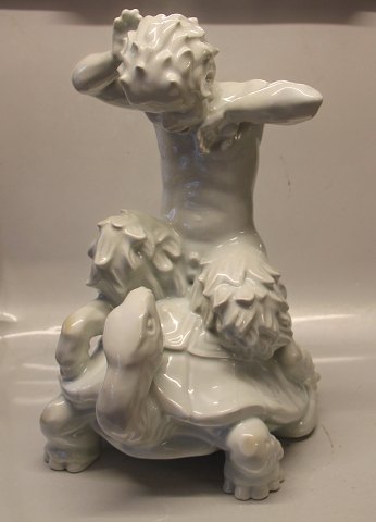 Royal Copenhagen Art Pottery 3082 Faun on tortoise  KK 1929 46,5 x 32 cm 
