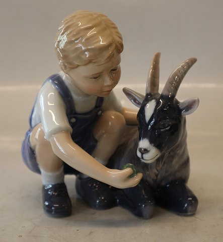Royal Copenhagen 0434 RC Boy with kid 13.5 x 14 cm Allan Therkelsen Children with farm animals (1249434)