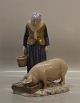 B&G Figurine
B&G 2237 Woman with Pig 22.5 cm Axel Locher