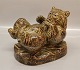 Royal Copenhagen Art Pottery
21191 RC Bear laying on the back 16 x 22 cm Knud Kyhn Dec. 1953