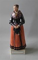 Royal Copenhagen figurine 
12101 RC Acht Pitter Bacher´s daugther Church-going Custume; Amager 13.25" / 34 
cm