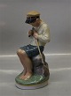 Royal Copenhagen figurine 
905 RC Buy Cutting Stick Chr. T. 1908 7.5"