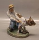 Royal Copenhagen figurine 0772 RC Boy with Calf Chr. T.  1906 6.5" Over glaze 
decoration
