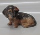 Royal Copenhagen figurine 3140 RC Dachshund Sitting.