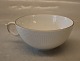 Tradition: 1275-525 Tea cup without saucer Royal Copenhagen 1275 White Half Lace 
with gold rim